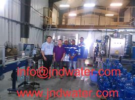 Shenzhen J&D Drinking Water install 120BPH Barrelled& 6000BPHbottled water line in Madagascar