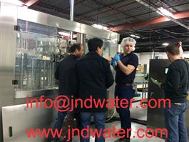 Shenzhen J&D Drinking Water install&train 12000bph bottled water line in Canada